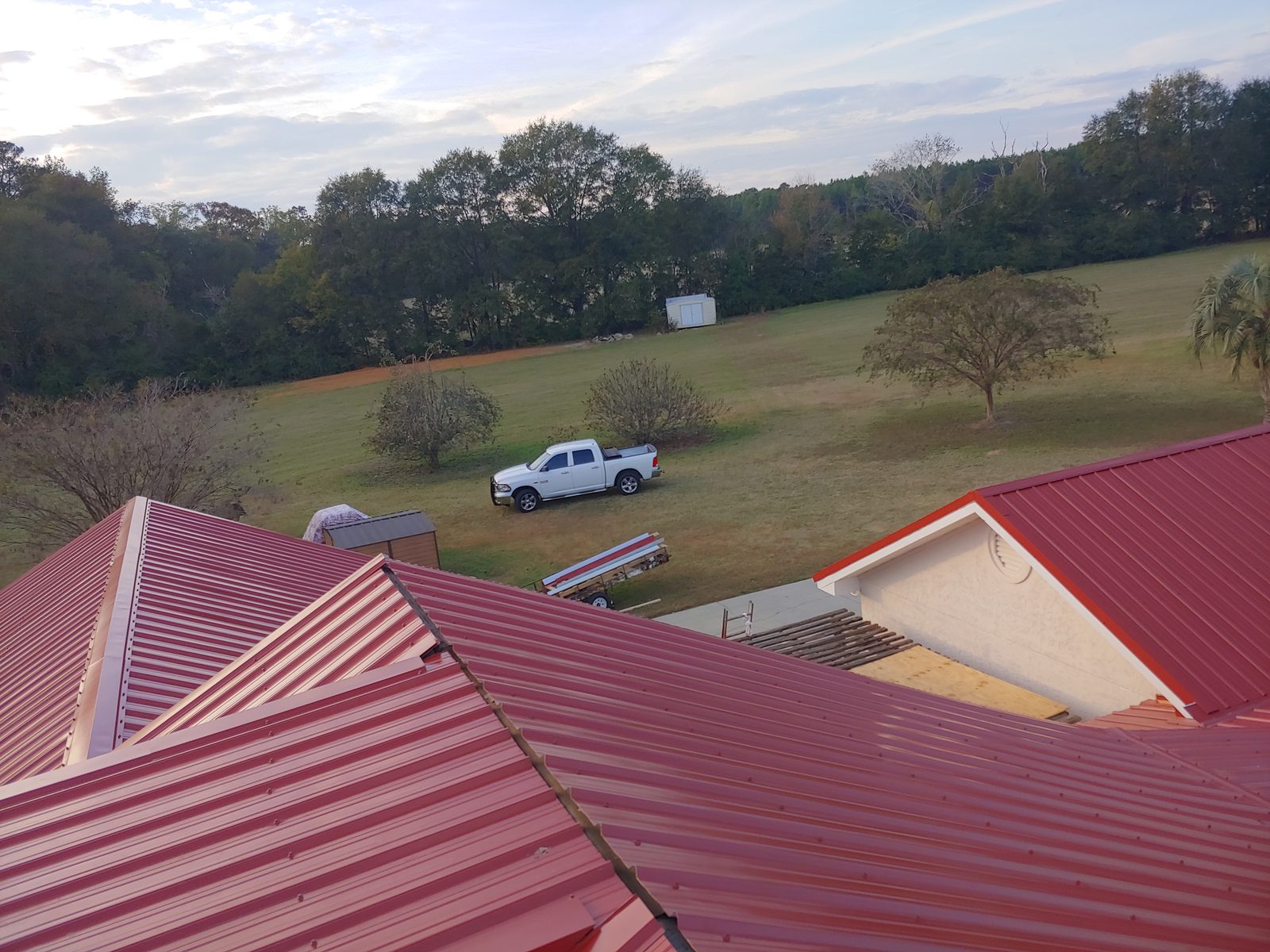 New red metal roof installed by MMAC Renovation in Laurens County GA
